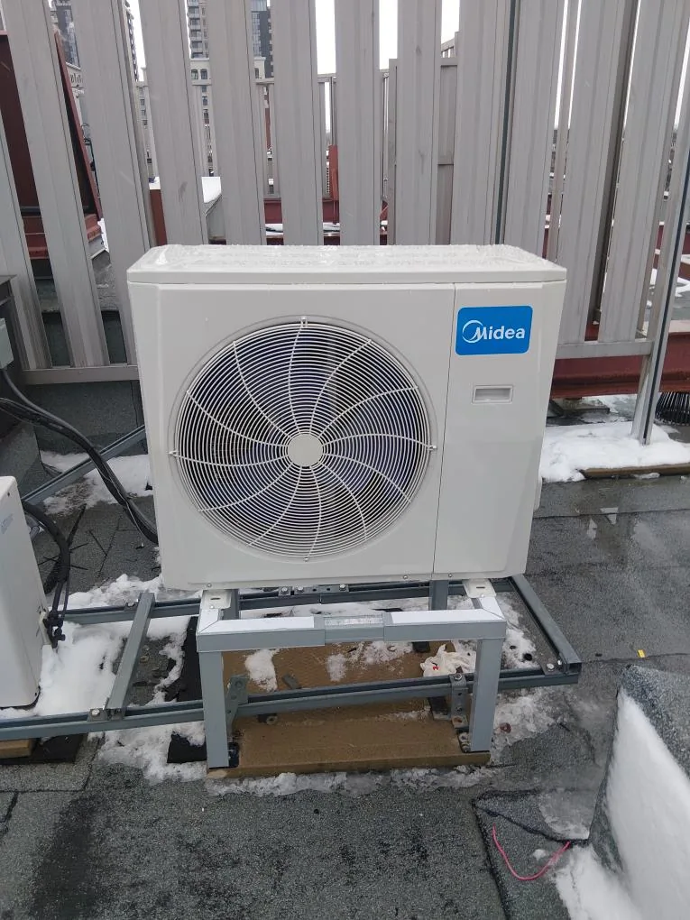 Midea heat pump installed on a rooftop in Nepean