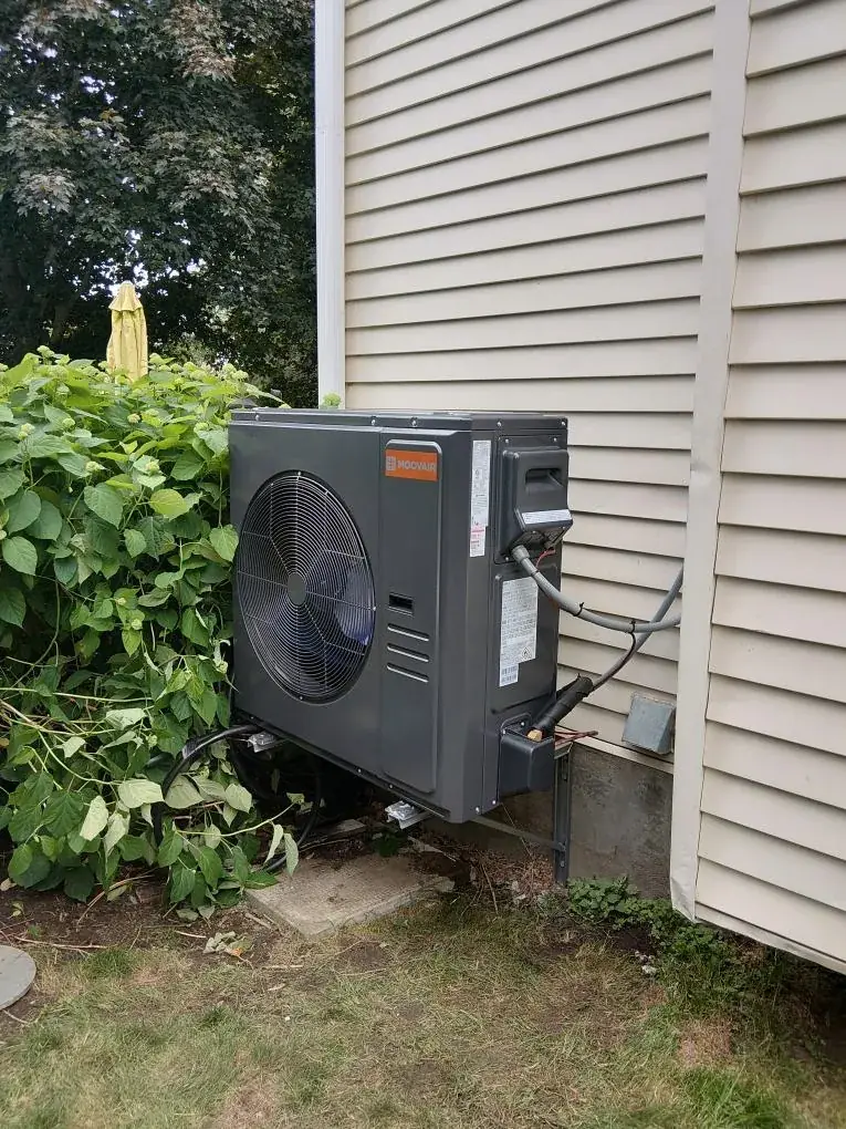 Moovair outdoor heat pump installed beside a home in Kanata